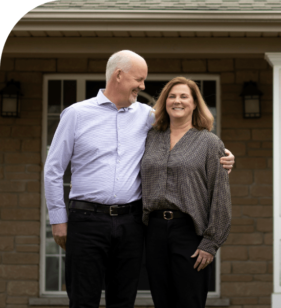 NCF donors looking at each other smiling.