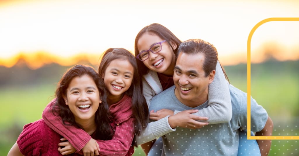 Portrait of Parents with two children.