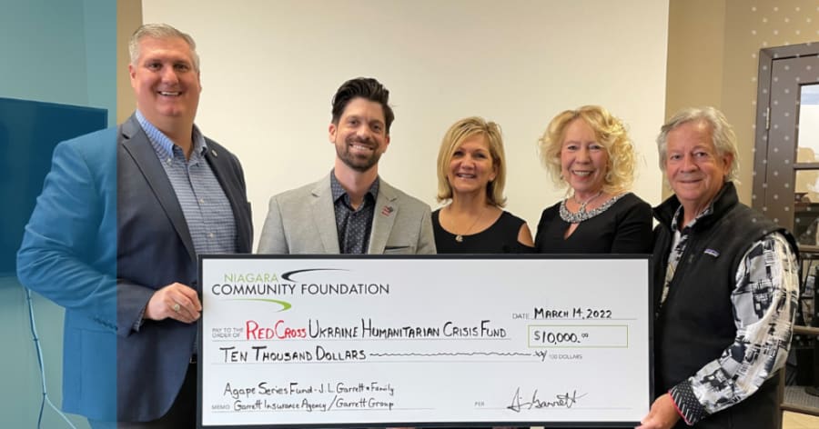 A $10,000 cheque is presented to the Niagara Community Foundation.