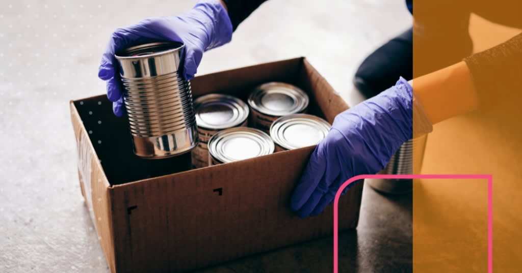 Person removing a can from a box.