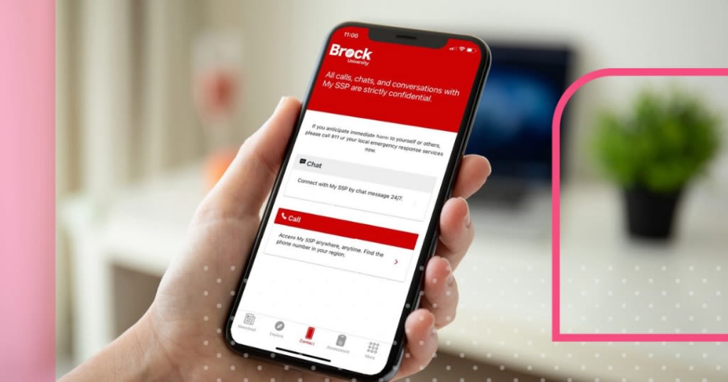Person holding smartphone displaying the app.