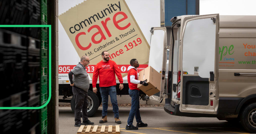Community Care members loading up a truck.